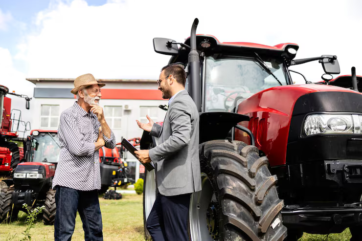 Farmer using equipment in field